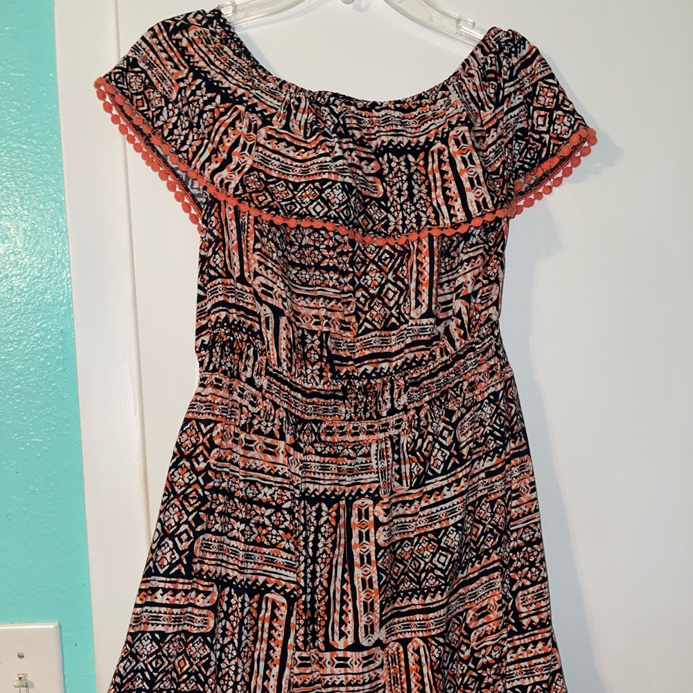 Orange black and white romper